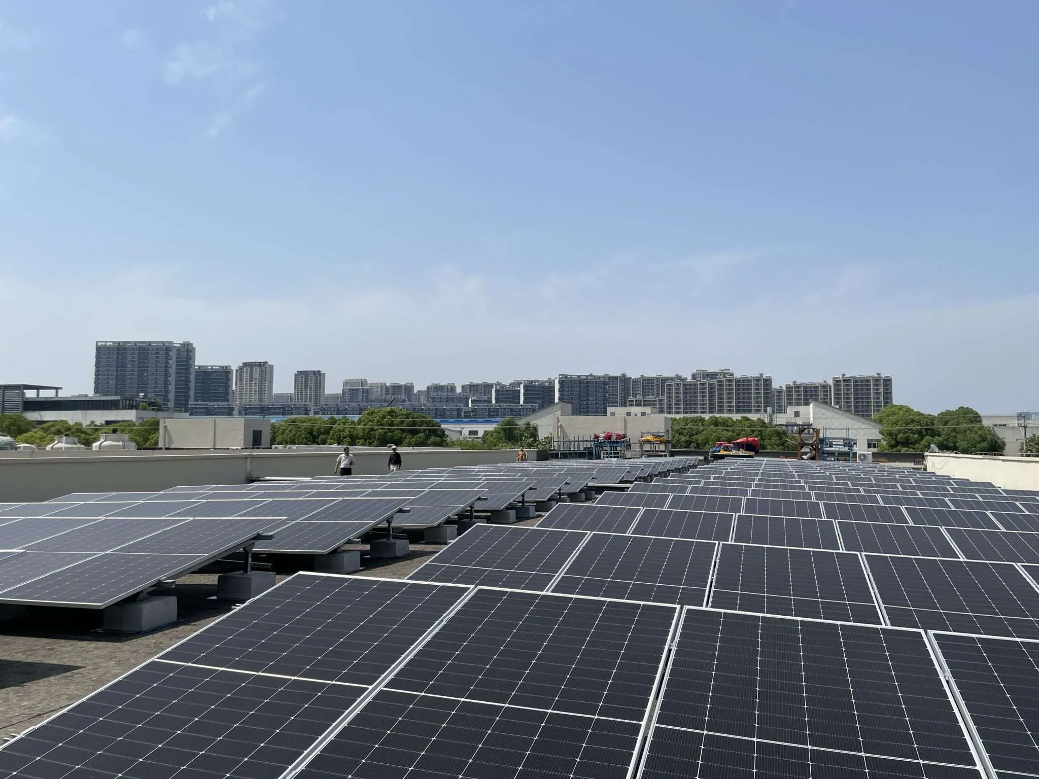 Rows of solar modules on the commercial rooftop in Wujiang District, Suzhou